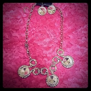 Necklace and pair of earrings